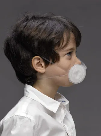 5 years old boy wearing Totobobo mask