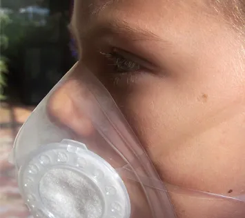 Kayla with her Totobobo mask