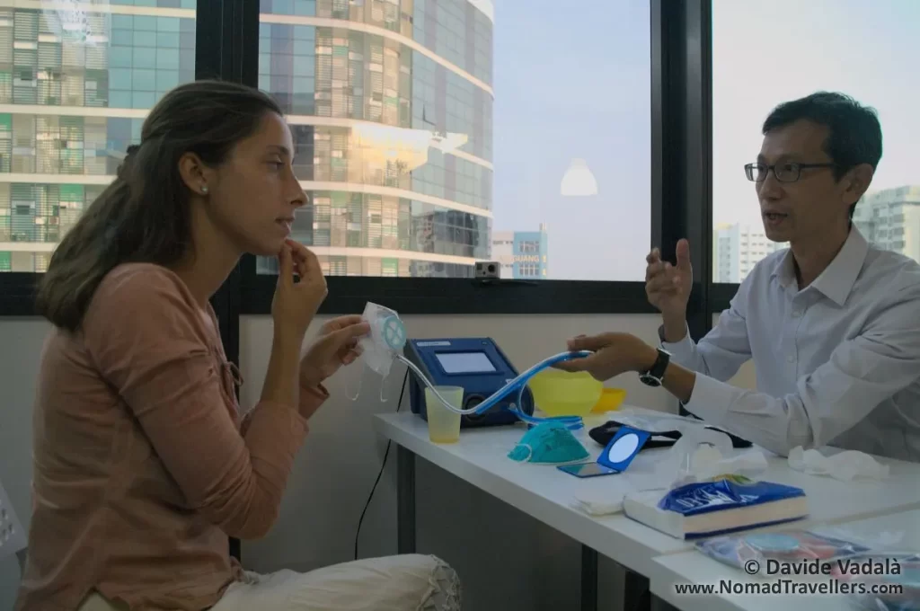 Oti applying water on her face to prepare for watermark seal check, a patented feature of Totobobo mask