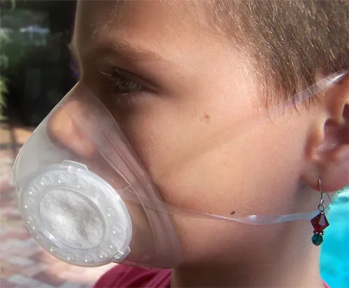 Kayla, young girl with cancer, Totobobo mask help her to avoid common flu in crowded area