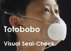 fitting TOTOBOBO mask on a boy