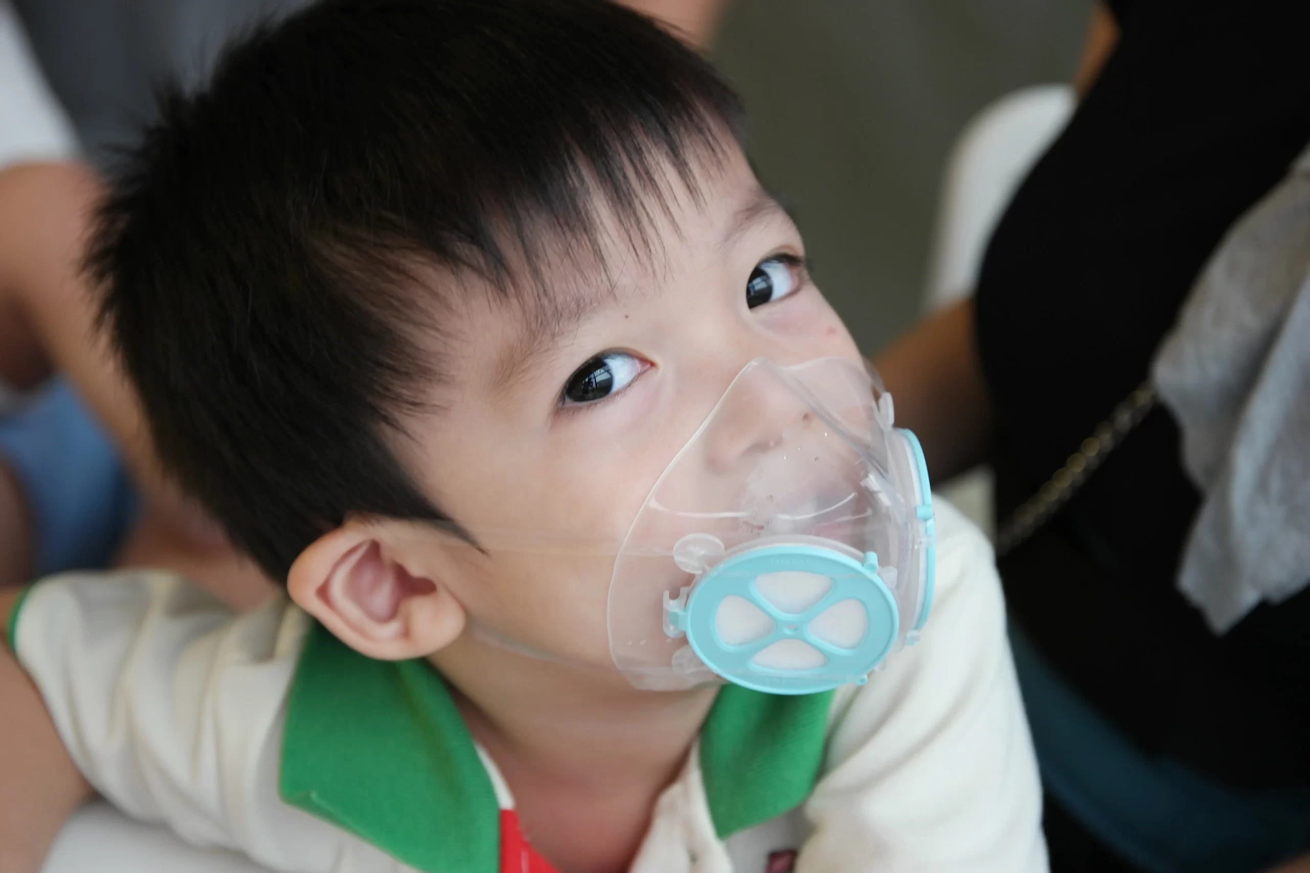 a boy wearing the Totobobo Mask