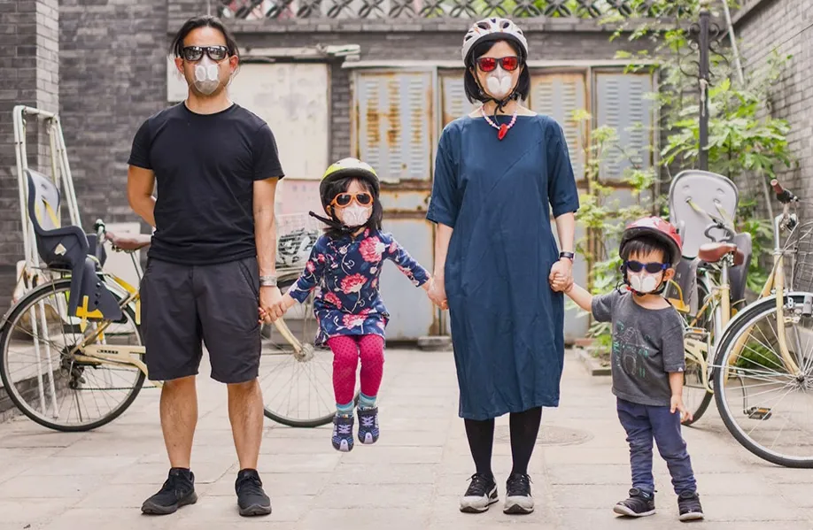 Chow's family wearing Totobobo mask